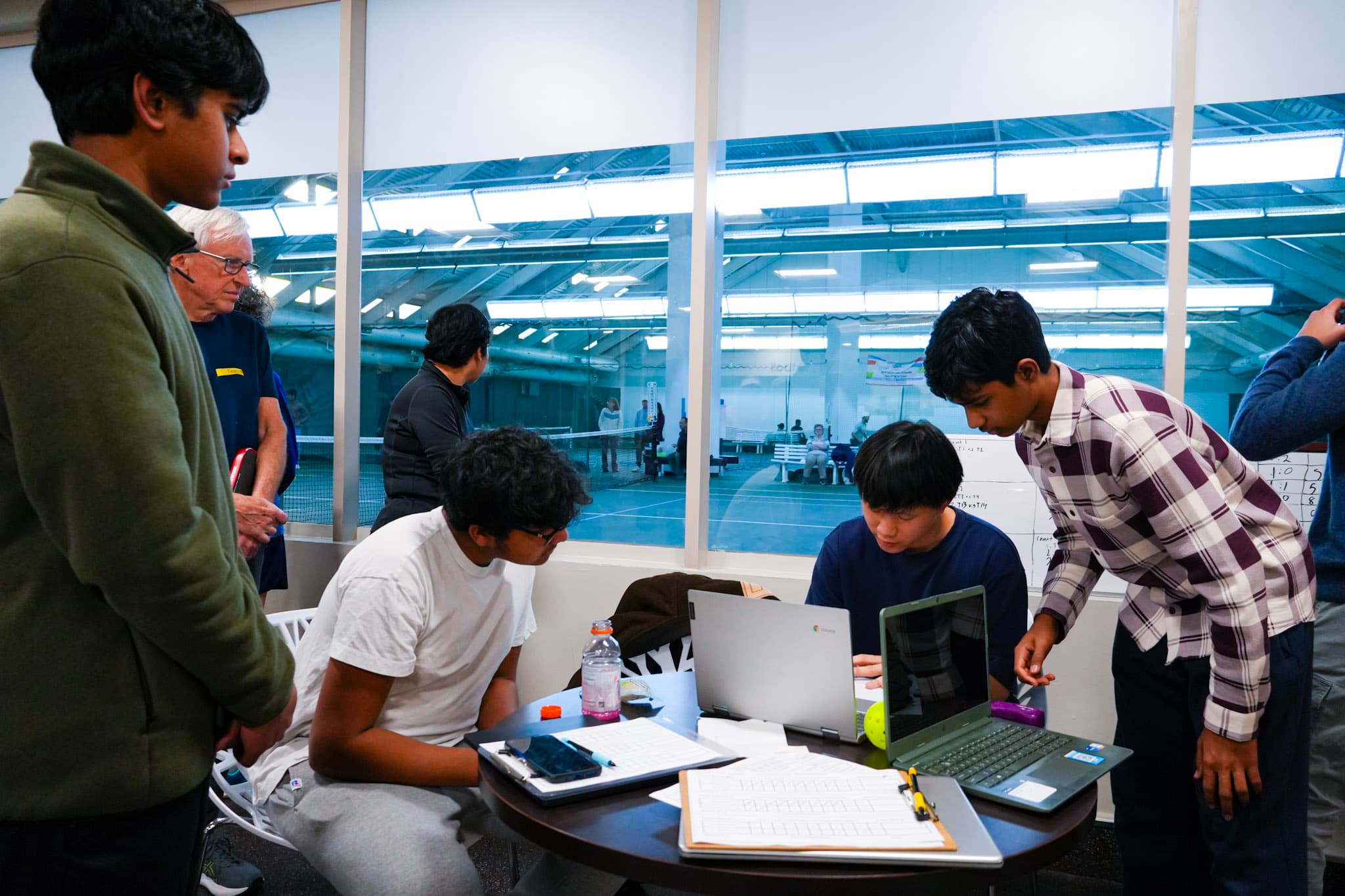 Chill N' Dill — the desk crew running scores at tournament HQ
