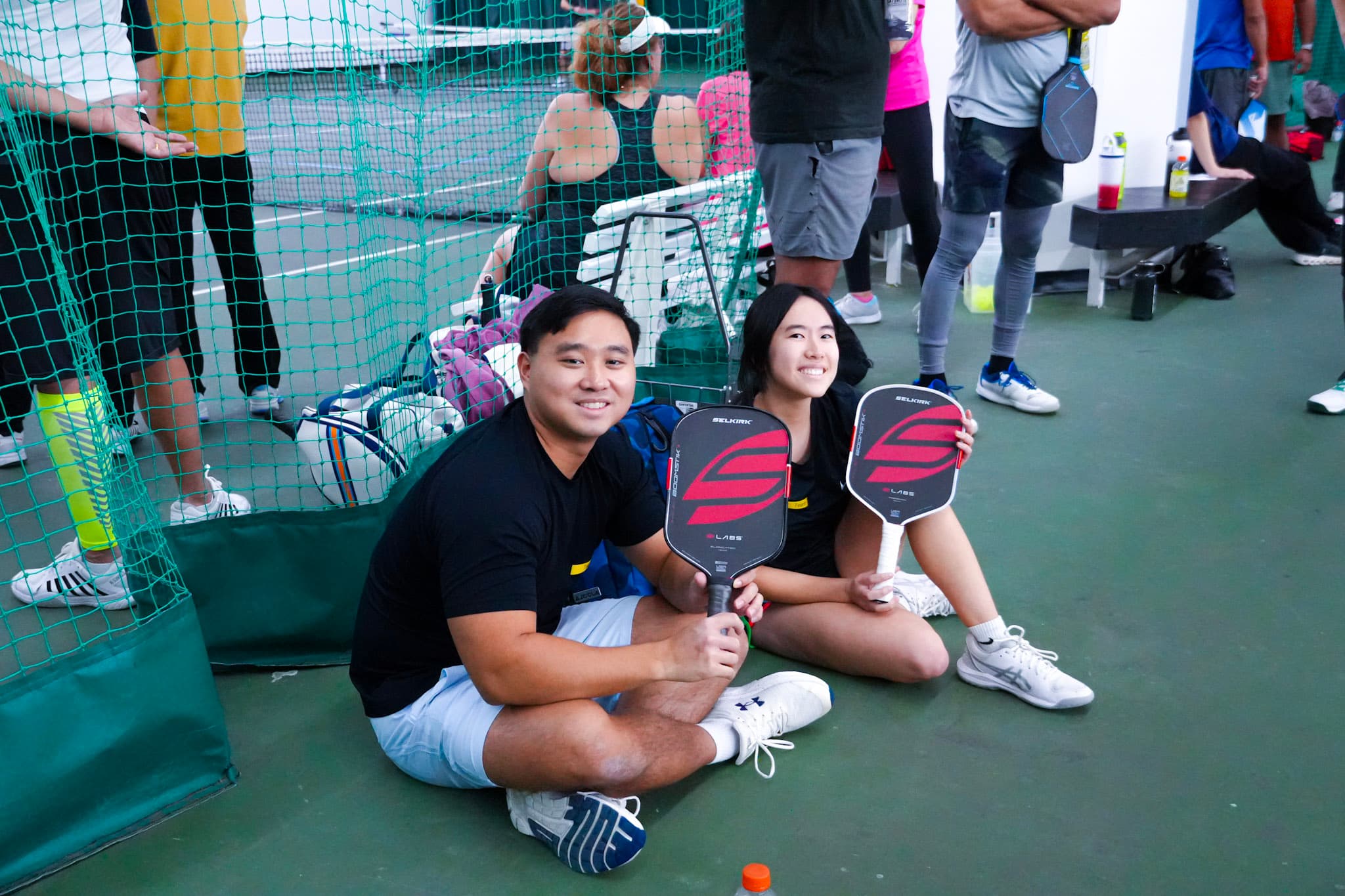 Chill N' Dill — a doubles pair ready court-side