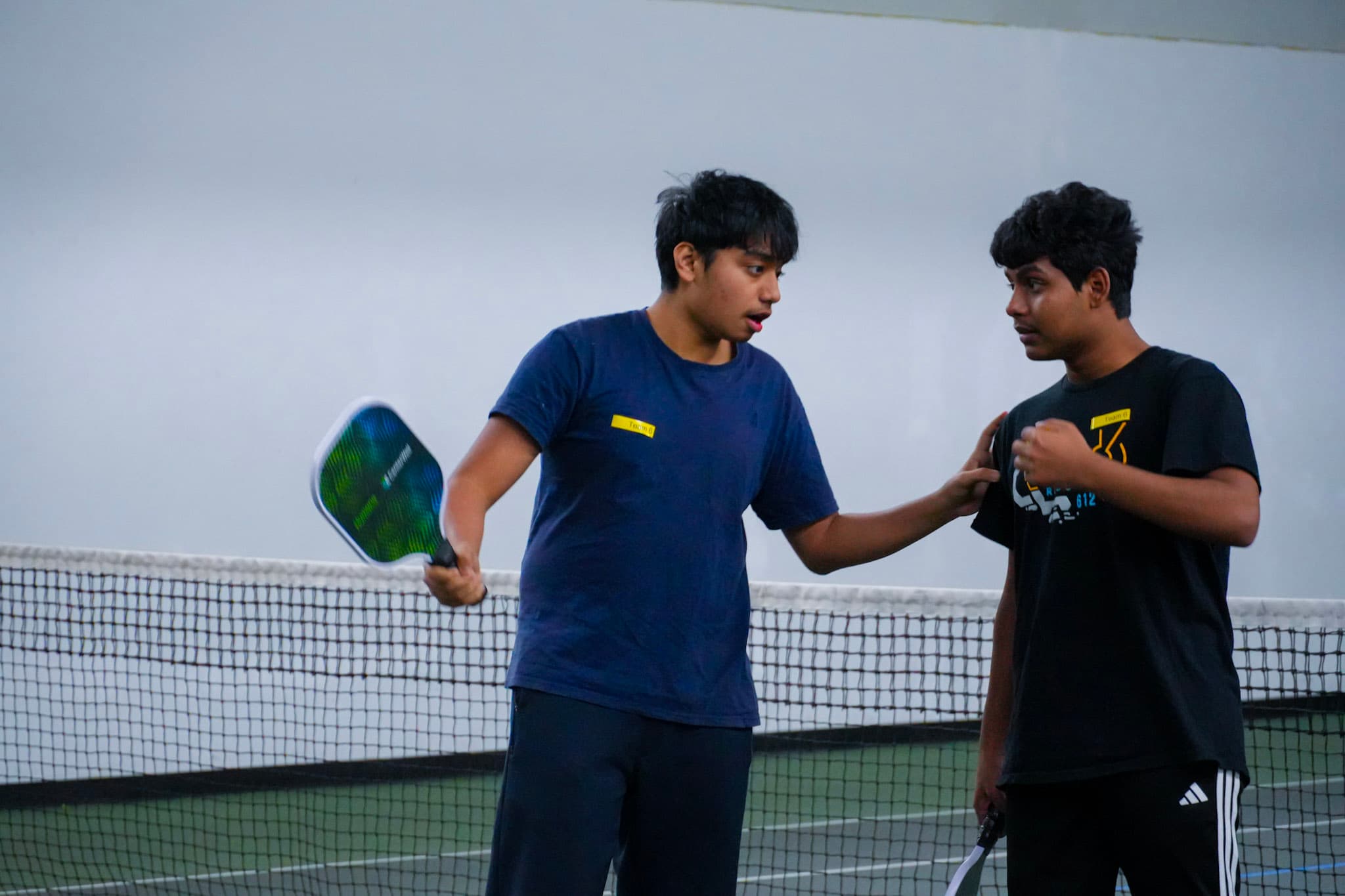 Chill N' Dill — partners talking strategy between points