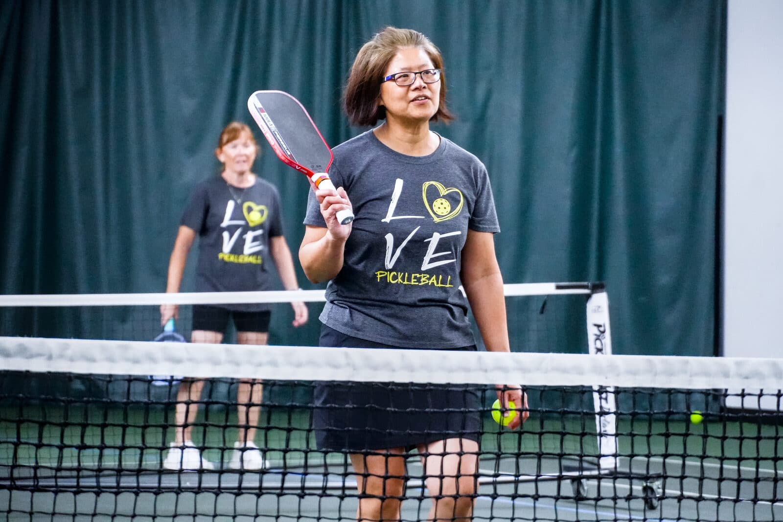 Midsummer Madness — partners at the net between points