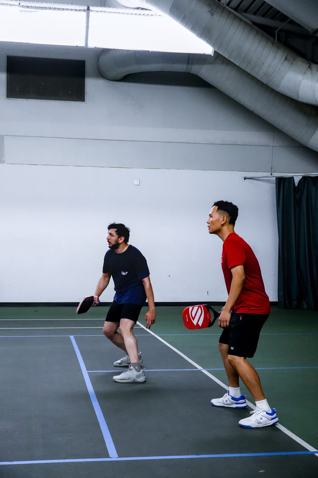 Midsummer Madness — a doubles rally in full swing
